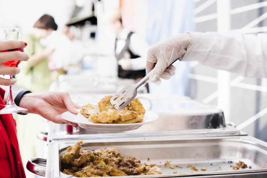 waiter-serving-woman-plate-with-food